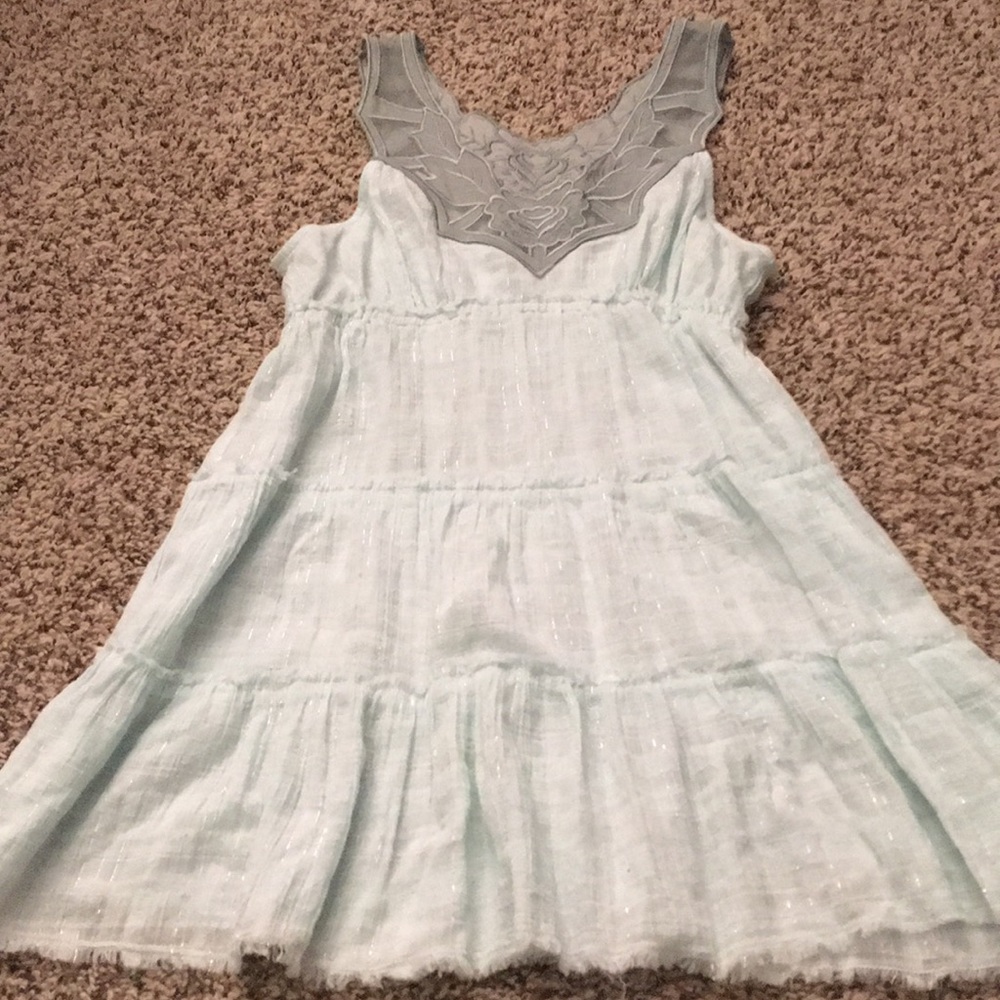Never worn Free People tunic in aquamarine/teal.